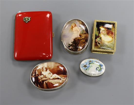 Two oval silver pill boxes decorated with erotic scenes and three other items,